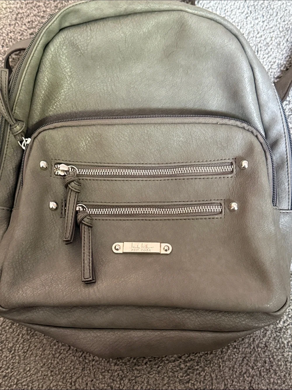 Nicole Miller Gray Faux Leather Backpack Bag. Adjustable Straps. 12”x12”x4”.